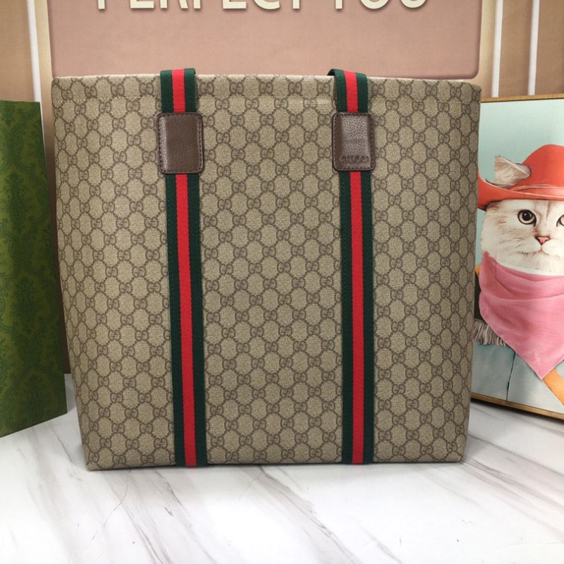 G*u*i shopping bags